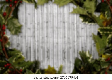 Flat design white board is featuring holly leaves, red berries and pine branches border, copy space. Winter decor, holiday sprig, seasonal arrangement, festive frame, rustic style, celebration