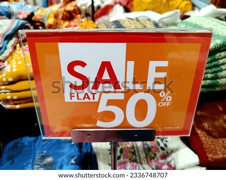Flat fifty Percent sale in shopping mall. 