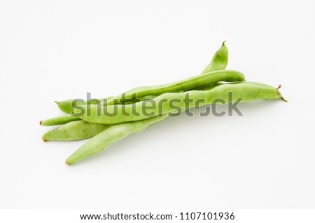 Flat green beans isolated on white background