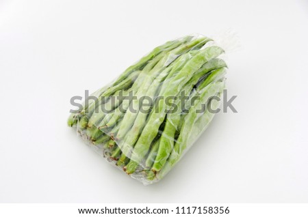 Flat green beans in plastic bag