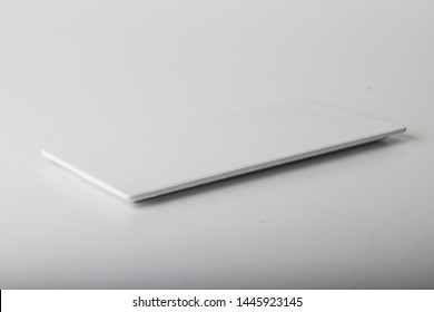 Flat Isolated White Serving Plate On White Background (different Angles)