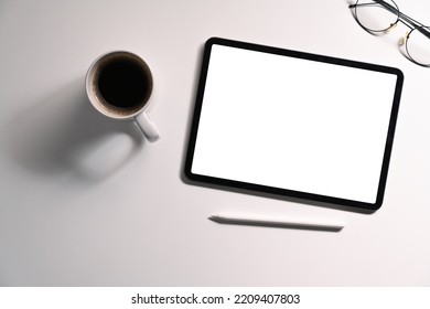 Flat Lat Digital Tablet With Empty Display, Coffee Cup And Eyeglasses On White Background