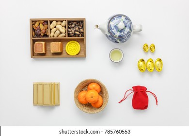 Flat lay of accessories Lunar & Chinese New Year holiday background concept.Difference essential accessory on the modern rustic white wallpaper.objects for mock up and template creative design.