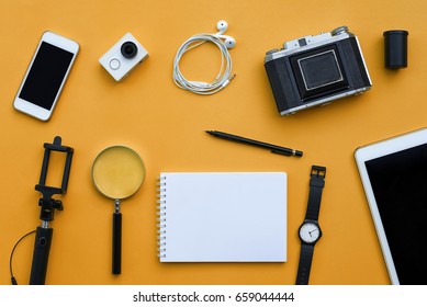 Flat Lay Of Accessories On Orange Desk Background Of Traveler, Voyage Concept.