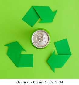 Flat Lay Of Aluminum Can And Recycle Symbol Arrows Minimal Eco Friendly Creative Concept.