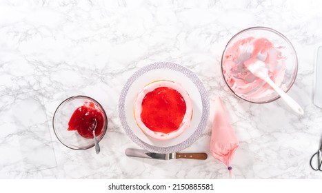 Flat Lay. Assembling Mermaid-themed 3 Layer Vanilla Cake On A Cake Stand.