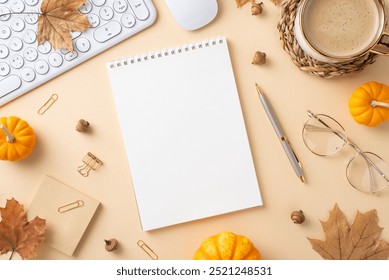 Flat lay of an autumn-themed workspace featuring a blank notebook, coffee mug, mini pumpkins, and keyboard - Powered by Shutterstock