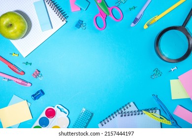 Flat Lay Background With Colorful Educational  Supplies On Bright Blue Background. Back To School Concept. School Backpack With Scissors, Notepads, Pen, Pencils, Supply. Top View, Overhead Copy Space