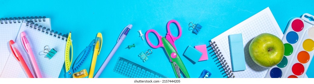 Flat Lay Background With Colorful Educational  Supplies On Bright Blue Background. Back To School Concept. School Backpack With Scissors, Notepads, Pen, Pencils, Supply. Top View, Overhead Copy Space