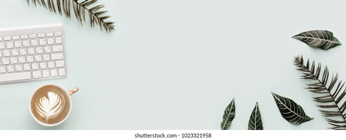 Flat Lay Banner, Simple Trendy Office Desk With Keyboard And Botanical Tropical Elements. Minimal Modern Hipster Composition