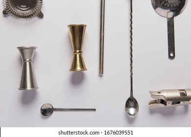 Flat Lay With Bartender Tools For Mixology And Cocktail Making, Such As Shaker,mixing Glass, Stirring Spoon, Jigger And Filter.