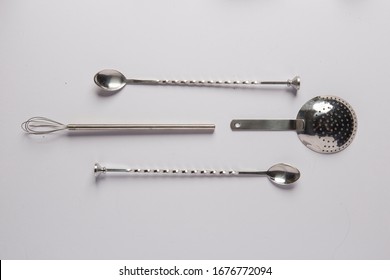 Flat Lay With Bartender Tools For Mixology And Cocktail Making, Such As Shaker, Stirring Spoon, Jigger And Filter.