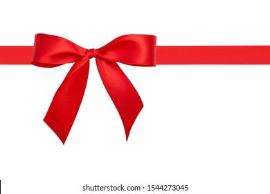 Flat lay beautiful big simple perfect red bow and bright red silk horizontal ribbon with copy space for text isolated on white background. Close up design element.