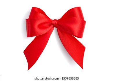 Flat lay beautiful red bright four-loop holiday gift bow made of satin ribbon with gray light soft shadow isolated on white background