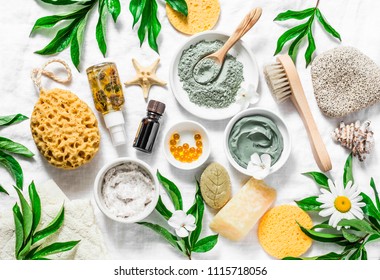 Flat lay beauty skin care ingredients, accessories. Natural beauty products on a light background, top view       