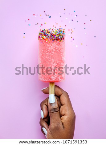 Flat lay of black woman holding icecream