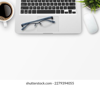 flat lay Blank notebook, computer keyboard,coffee,glasses and other office equipment on white office desk. Top view with copy space. 