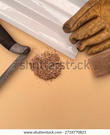 Flat Lay Of Carpenter Tools With Saw Sheeting Gloves, Wood Block Sawdust And Copy Space