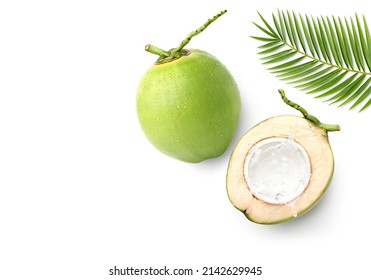 Flat Lay Of Coconut Juice Splash In Half Fruit Isolated On White Background.