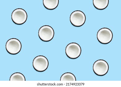 Flat lay of coconut on light blue background.Summer background. - Shutterstock ID 2174923379