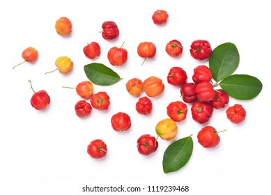 Flat Lay Of Colorful Acerola Cherry With Green Leaves On White Background, Top View 