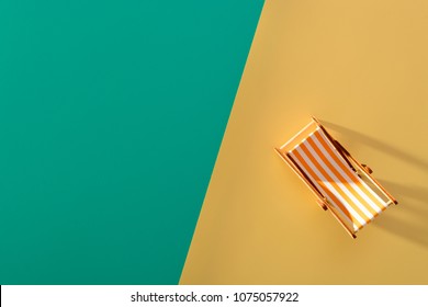 Flat Lay Of A Composed Miniature Of Beach Lounge Area With Deck Chair On The Colorful Surface