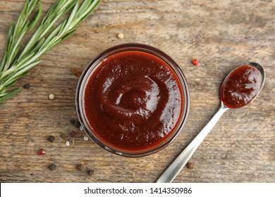 Flat Lay Composition With Barbecue Sauce On Wooden Background