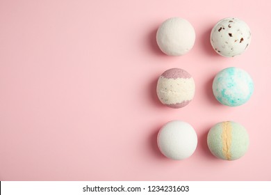 Flat lay composition with bath bombs and space for text on color background