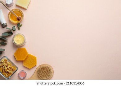 Flat Lay Composition With Beeswax And Cosmetic Products On Beige Background. Space For Text