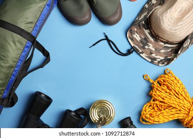 Flat Lay Composition With Camping Equipment On Color Background