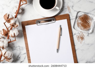 Flat lay composition with clipboard and blank paper on white marble background . Space for text