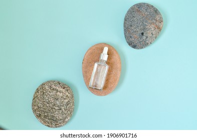 Flat Lay Composition With Cosmetic Products On Color Background. Organic Sponges, Sea Stones