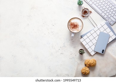 Flat lay composition with cup of coffee on white background
