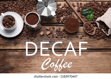 Flat lay composition with decaf coffee beans on wooden table