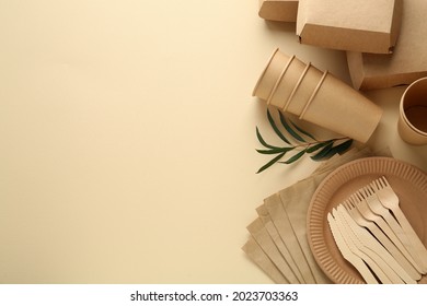 Flat lay composition with eco friendly products on beige background, space for text
