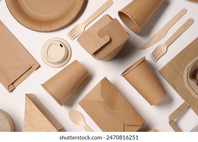 Flat lay composition with eco friendly food packagings on white background
