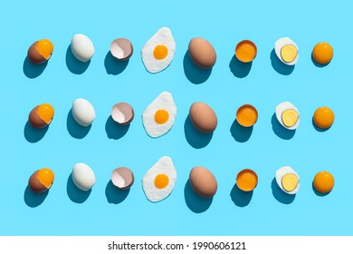 Flat Lay Composition with eggs cooked in different ways on blue background.