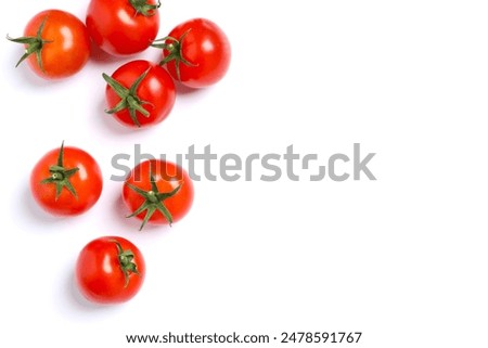 Flat lay composition with fresh cherry tomatoes on white background. Ripe vegetables