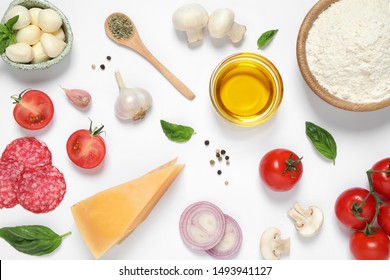 Flat Lay Composition With Fresh Ingredients For Pizza On White Background