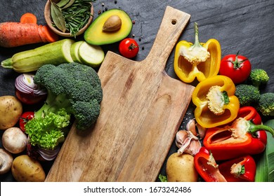 Flat Lay Composition With Fresh Products On Grey Table. Healthy Cooking