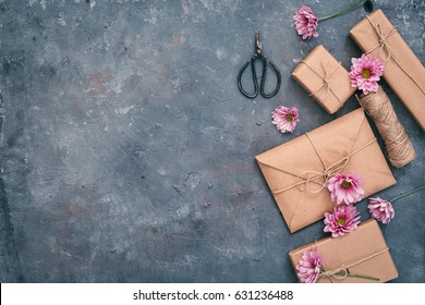 Flat Lay Composition With Gift, Envelope And Flowers