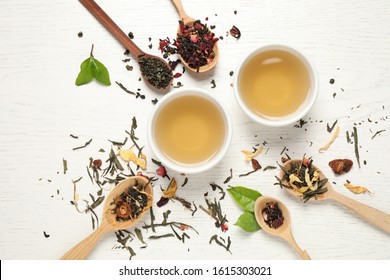 Flat Lay Composition With Green Tea On White Wooden Table