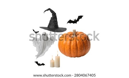 Flat lay composition of Halloween elements including a witch hat, carved pumpkin, ghost, and flying bats.