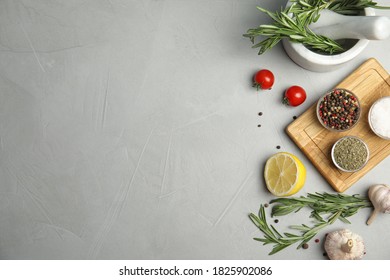 Flat Lay Composition With Ingredients For Cooking On Grey Table. Space For Text