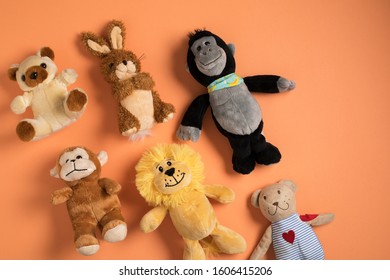 Flat lay composition with many cute animal plush toys. Collection of children stuffed toys, bed time stories concept