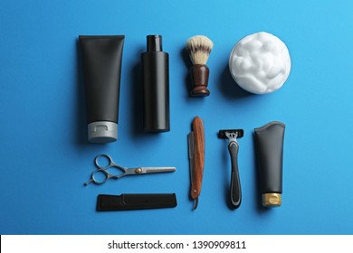 Flat lay composition with men's cosmetic products on color background. Space for design