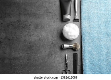 Flat lay composition with men's cosmetic products on grey background. Space for design