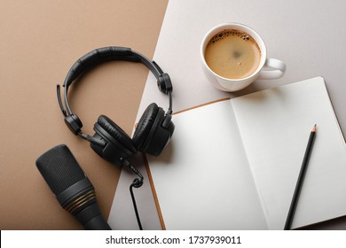 Flat Lay Composition With Microphone For Podcasts  And Black Studio Headphones On Brown Background With Coffee And Laptop, Learning Online Education Concept.
