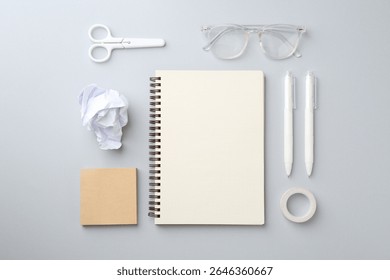 Flat lay composition with notebook on gray background