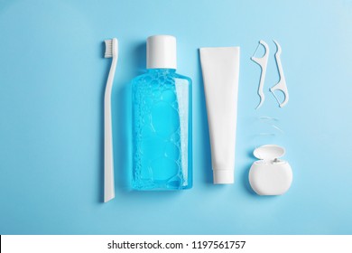 Flat Lay Composition With Oral Care Products On Color Background. Teeth Hygiene